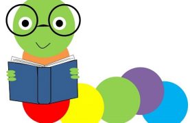 Cartoon caterpillar reading a book