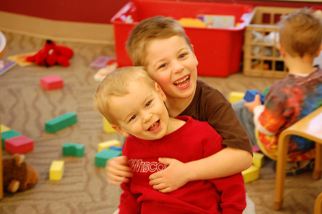 two siblings having fun at block building storytime event