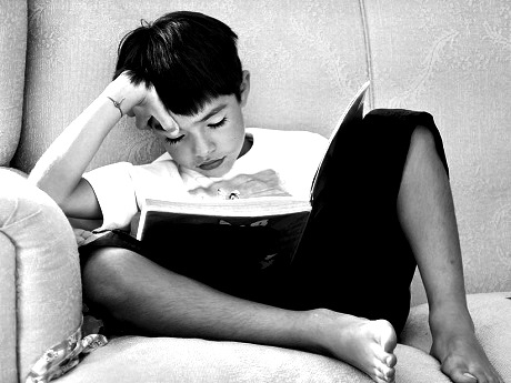 Boy reading a book