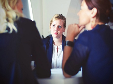 Career women in conversation.