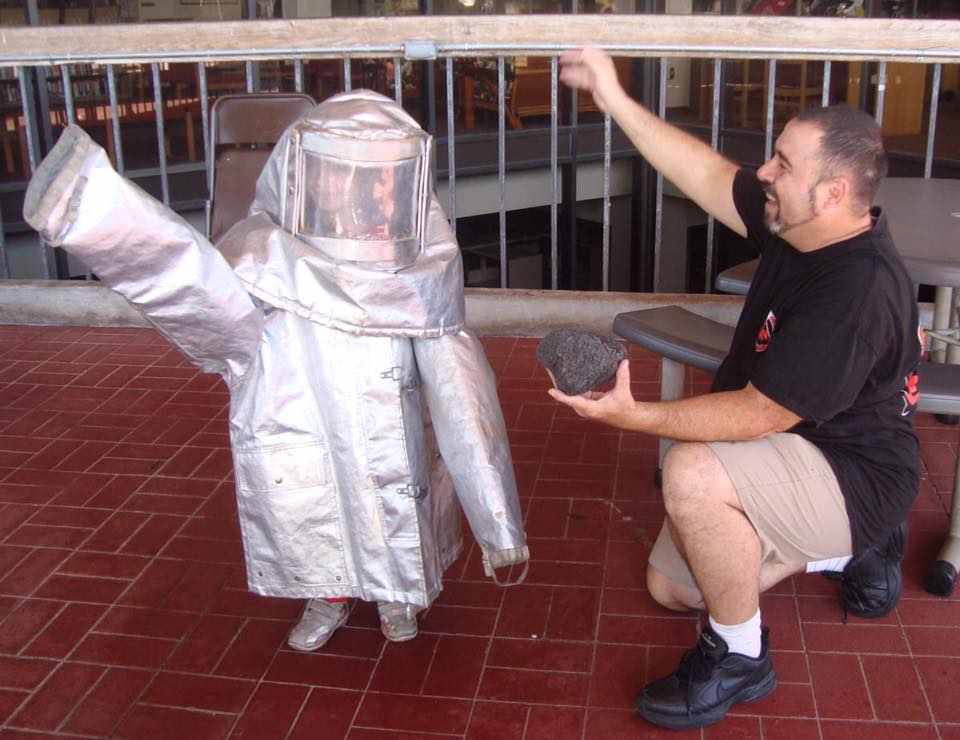 child in a fire proof suit