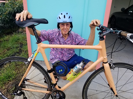 Photo of presenter Gary Harrold with bicycle