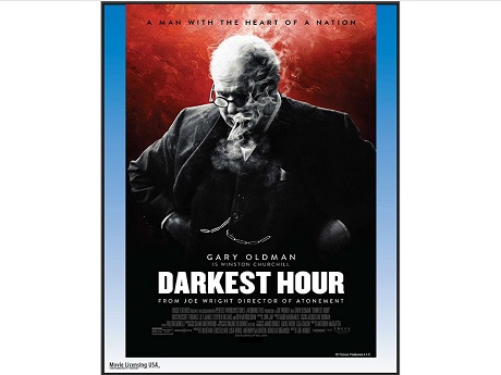 Movie poster featuring Gary Oldman as Winston Churchill, huffing on his pipe, wreathed in smoke, hands on his hips against red background