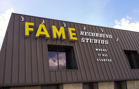 Brown building with "FAME RECORDING STUDIOS WHERE IT ALL STARTED" on the building