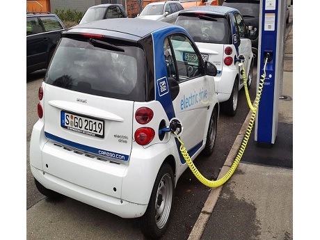 Electric vehicle being charged