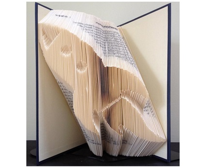 Book folding into rocket