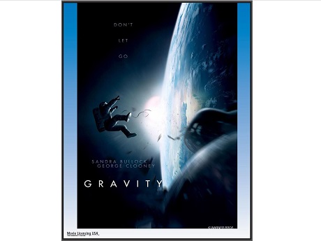 Film poster for Gravity with an astronaut hovering above Earth surrounded by space debris