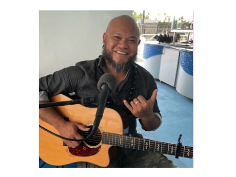 local musician Kalima with guitar