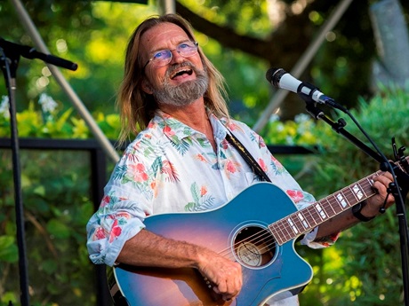 Uncle Wayne singing and playing guitar