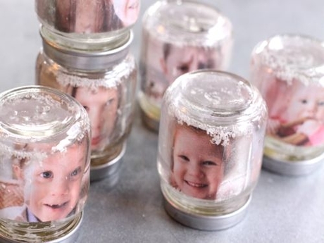 Snow globes with photos inside.