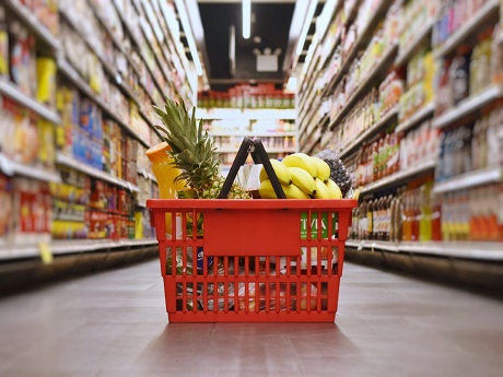 Grocery basket full of food in aile