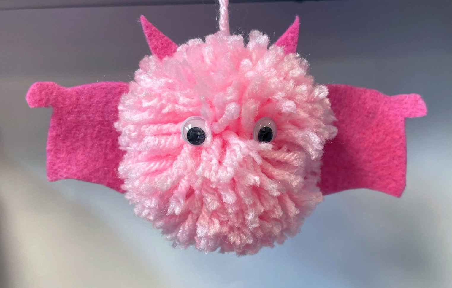 pink pom pom bat