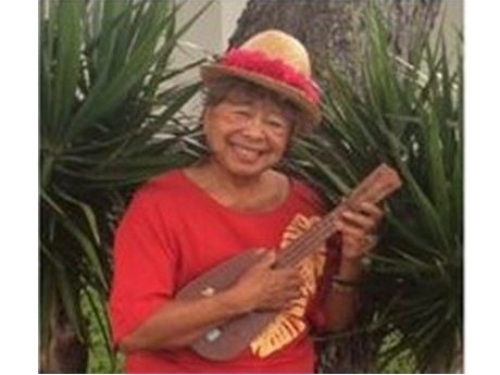 Kupuna Ford holding an ukulele