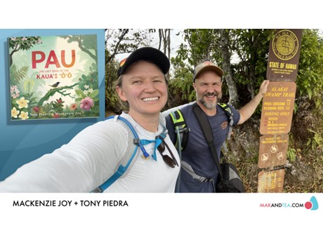 A selfie of a man and a woman on a trail in Hawaii.