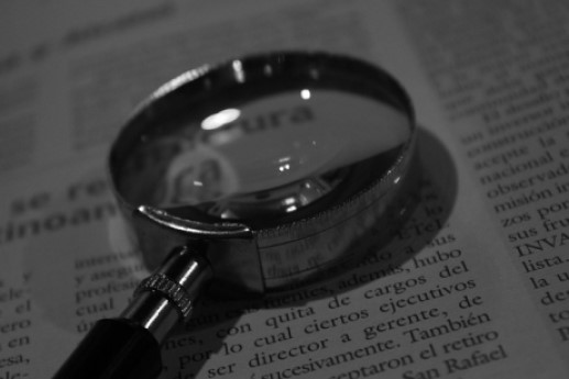 magnifying glass on paper